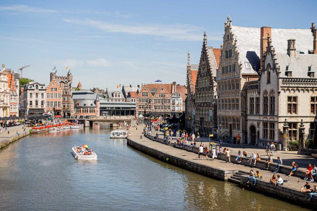 A big canal in Ghent next to historic building